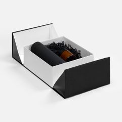 Коробка из переплетного картона 2 мм с оригинальной конструкцией: две симметричные створки открываются, создавая эффектную презентацию содержимого....