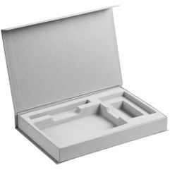 Коробка с клапаном на магните, выполнена из переплетного картона, кашированного бумагой Malmero. Размер ложемента под ежедневник 10х16х2,2 см. Размер...