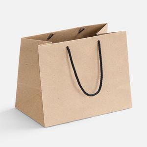 Пакет из крафт-бумаги 125 г/м⊃2;. Выдерживает вес до 2 кг.